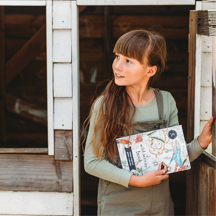 Girl with wild activity book